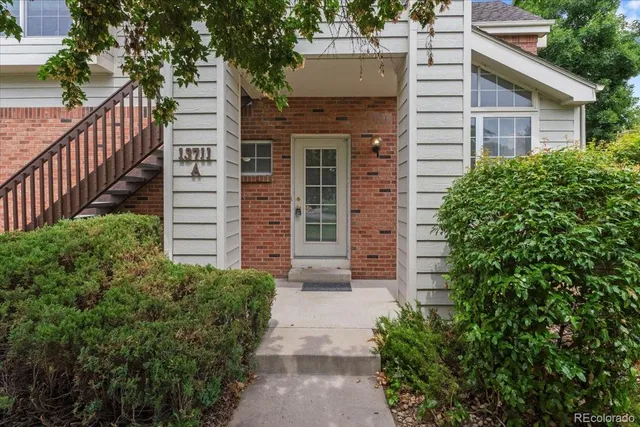 a view of a pathway with house and front view of a house