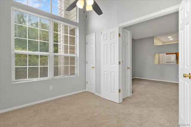 an empty room with windows