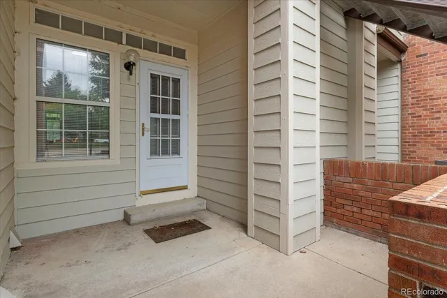 a view of front door and bedroom