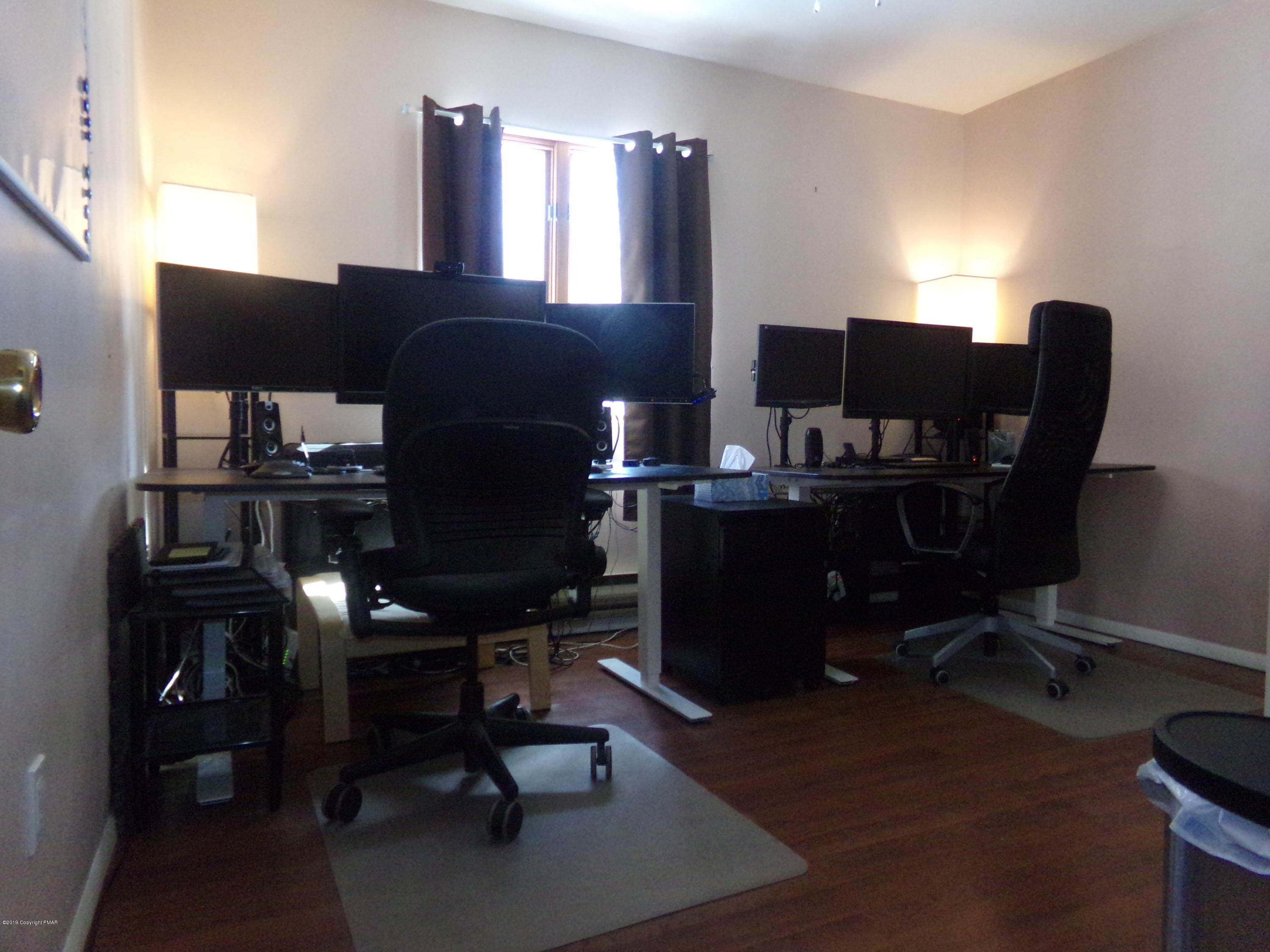 1193 Bear Drive Bushkill, PA 18324 - Photo 23 of 29 a view of a workspace with furniture and a window