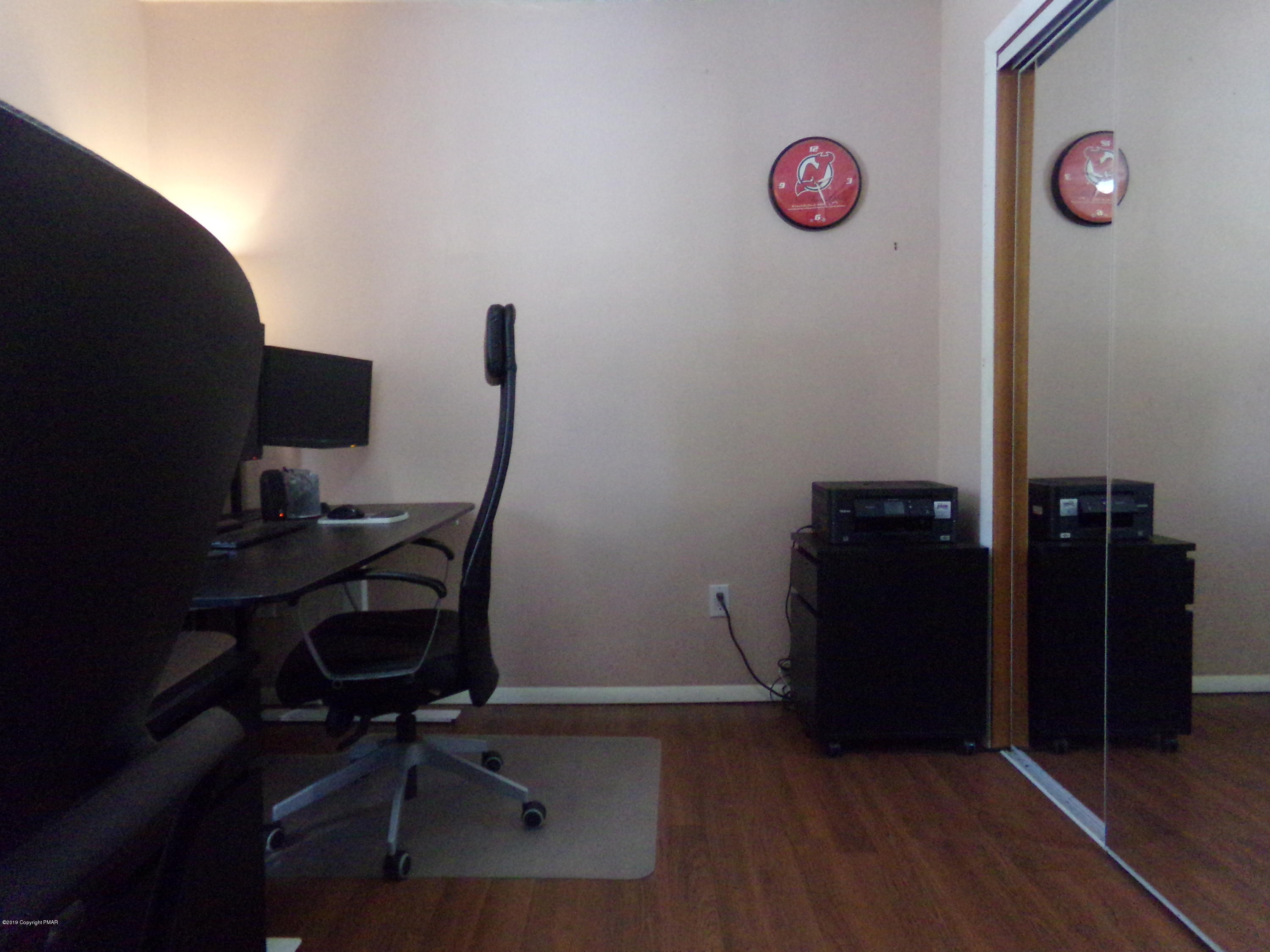 1193 Bear Drive Bushkill, PA 18324 - Photo 25 of 29 a view of workspace with wooden floor windows