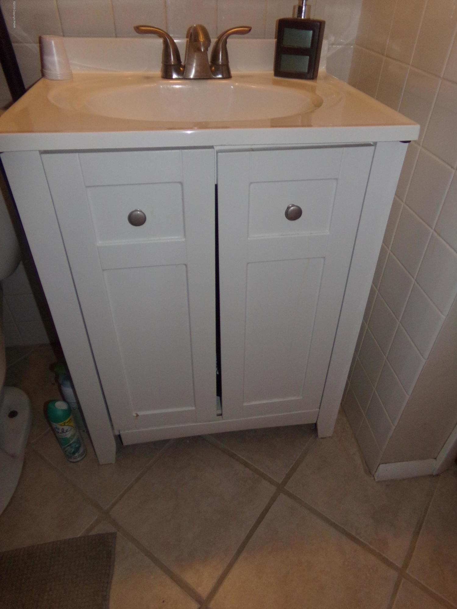 1193 Bear Drive Bushkill, PA 18324 - Photo 26 of 29 a bathroom with a sink and a mirror