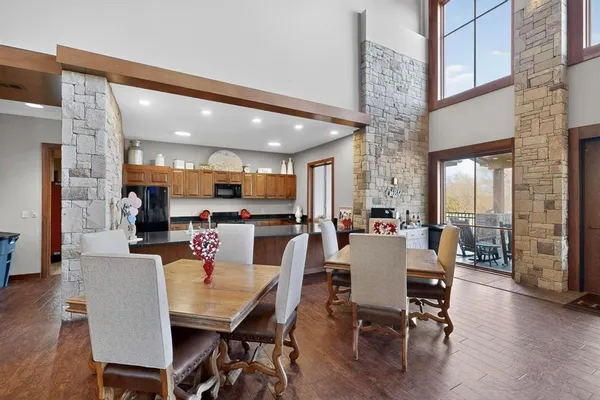 a view of a dining area with furniture and wooden floor