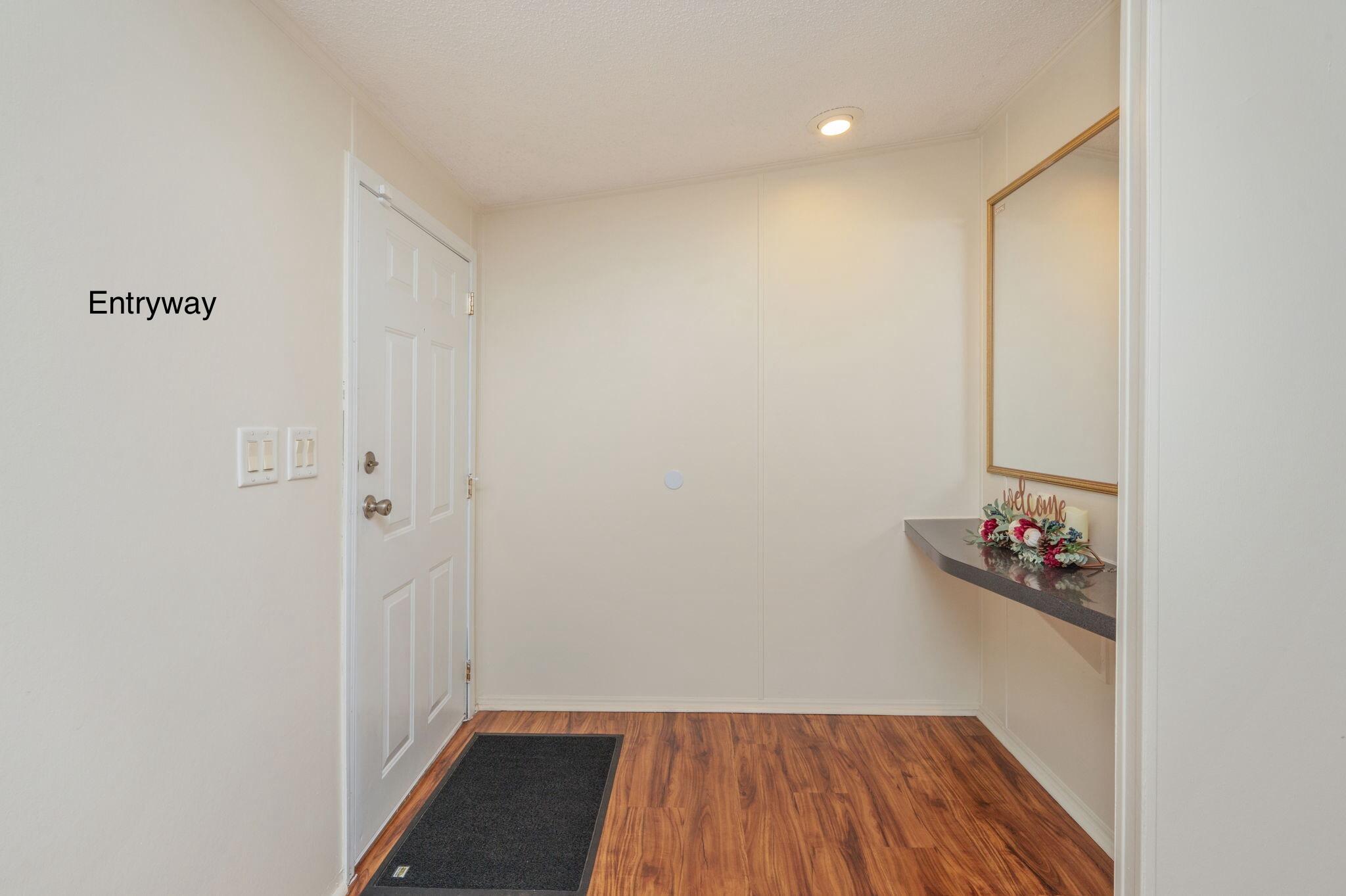 1314 Riddle Drive Westville, FL 32464 - Photo 5 of 35 a view of room with wooden floor