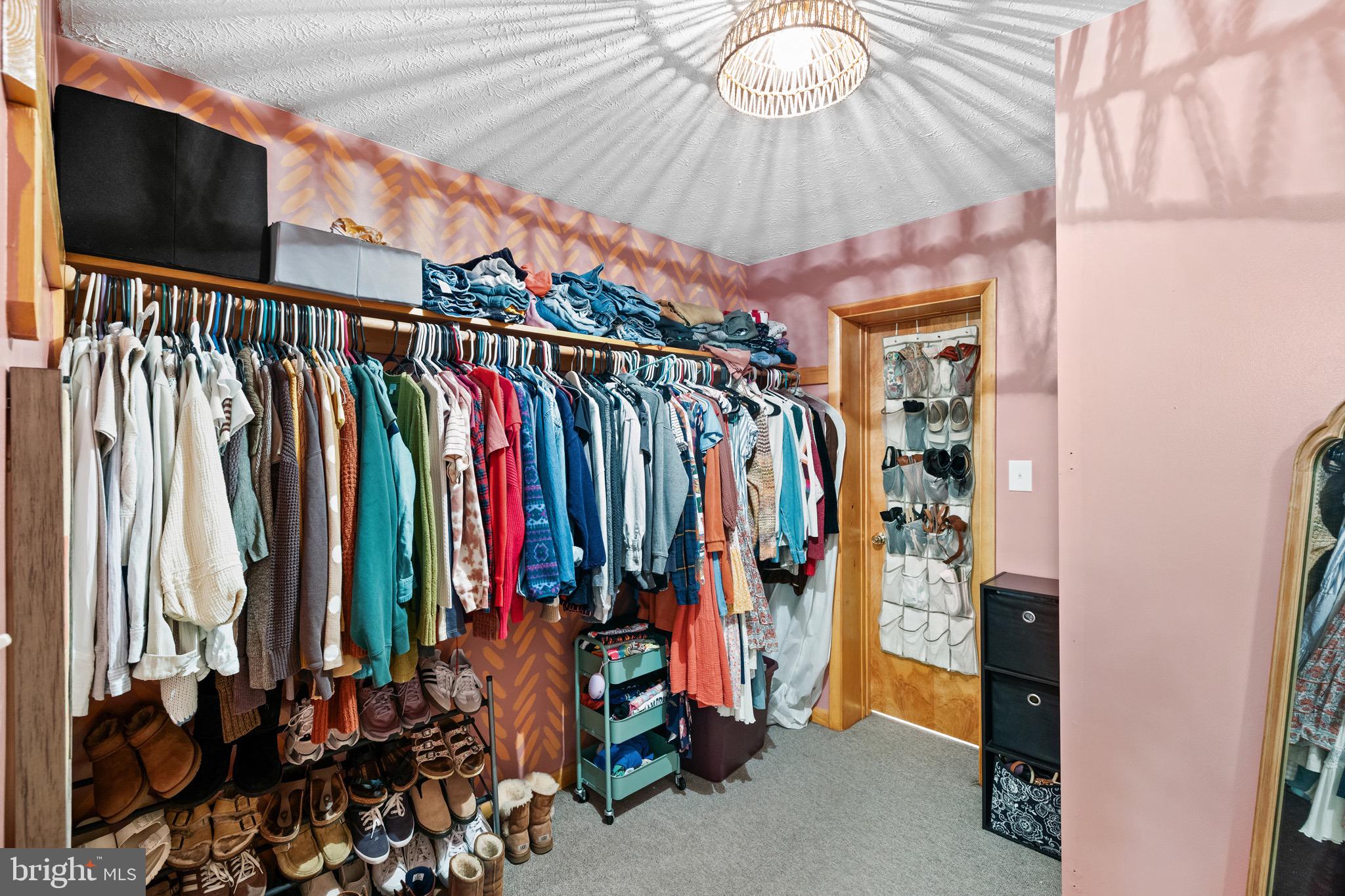 3360 Senedo Road Quicksburg, VA 22847 - Photo 17 of 58 a view of walk in closet with clothes