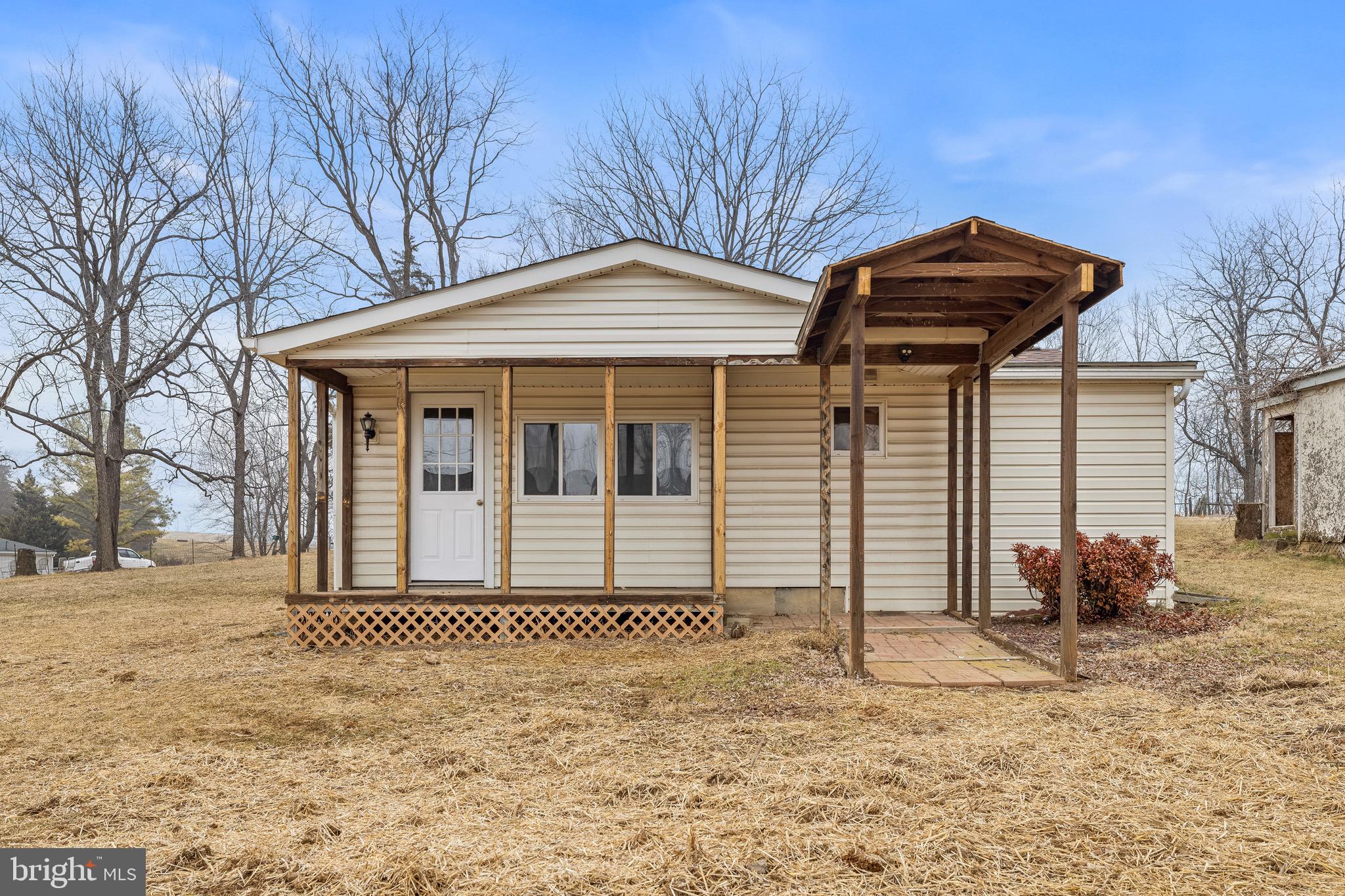 3360 Senedo Road Quicksburg, VA 22847 - Photo 35 of 58 a front view of a house with a yard