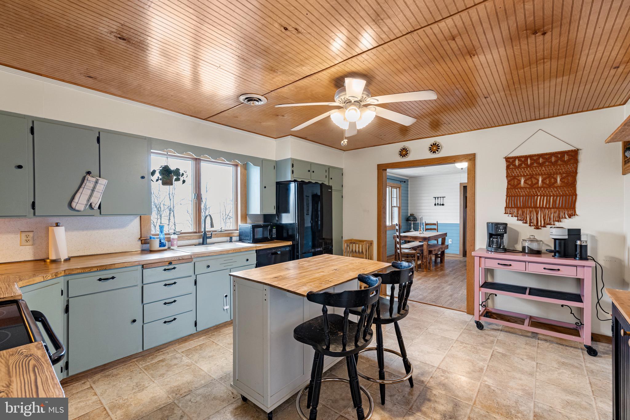 3360 Senedo Road Quicksburg, VA 22847 - Photo 5 of 58 a large kitchen with a table and chairs