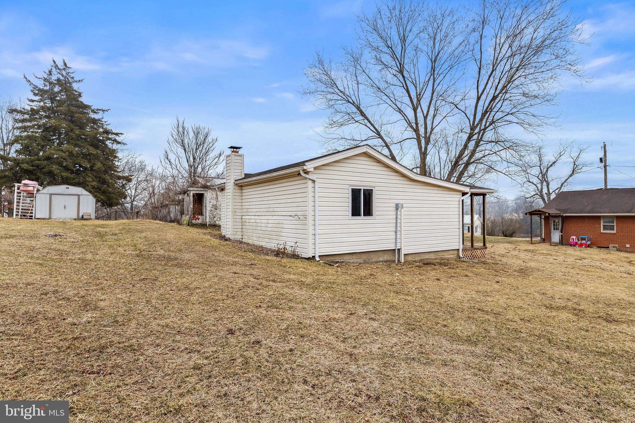 3360 Senedo Road Quicksburg, VA 22847 - Photo 52 of 58 a view of a house with a yard