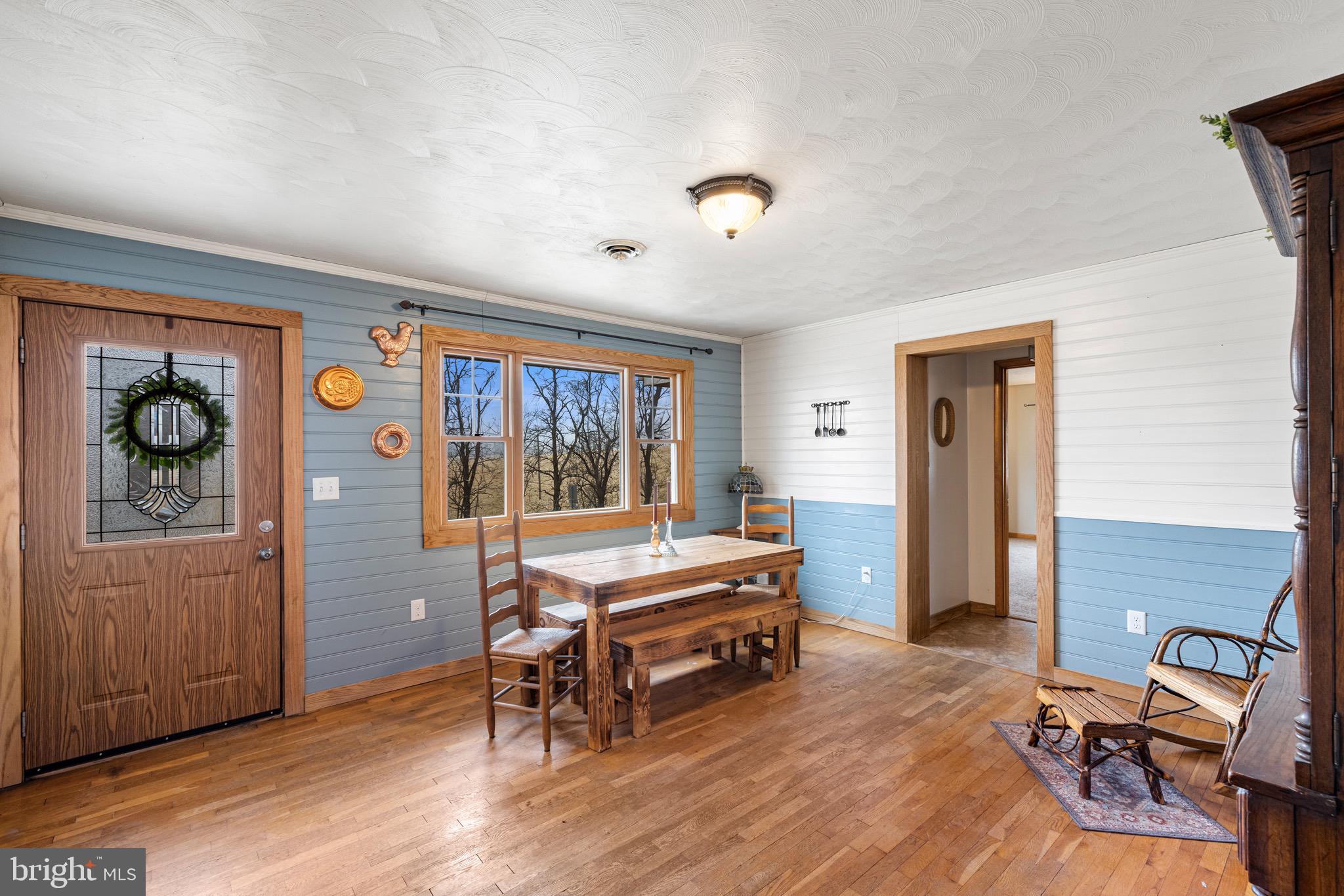 3360 Senedo Road Quicksburg, VA 22847 - Photo 9 of 58 a living room with furniture and wooden floor