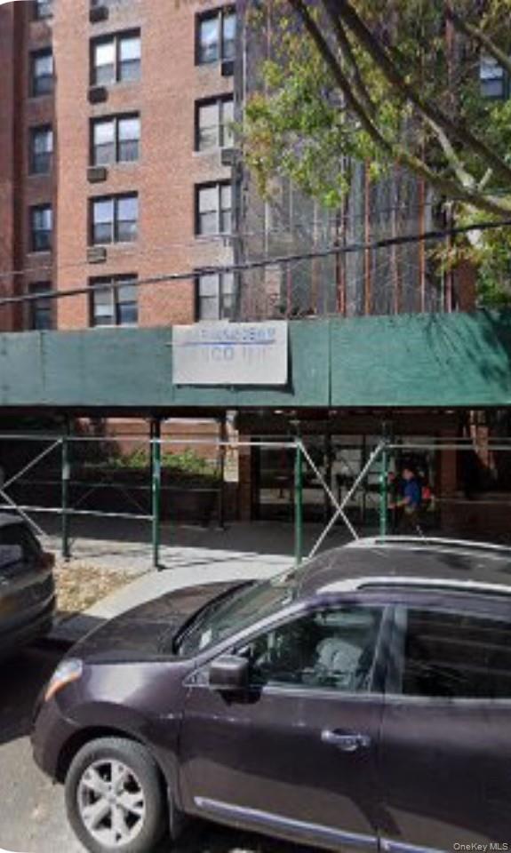 137-05 Franklin Avenue, Unit 3A Queens, NY 11355 - Photo 1 of 6 a car parked in front of a building