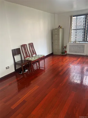 a view of a livingroom with furniture and wooden floor