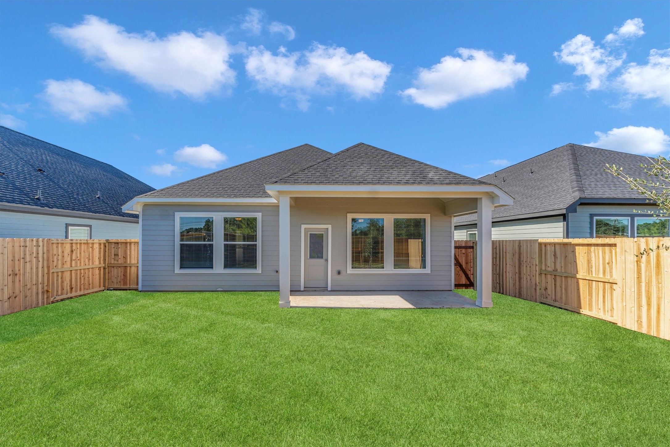 16026 Copper Skies Way Cypress, TX 77429 - Photo 7 of 47 front view of a house with a yard