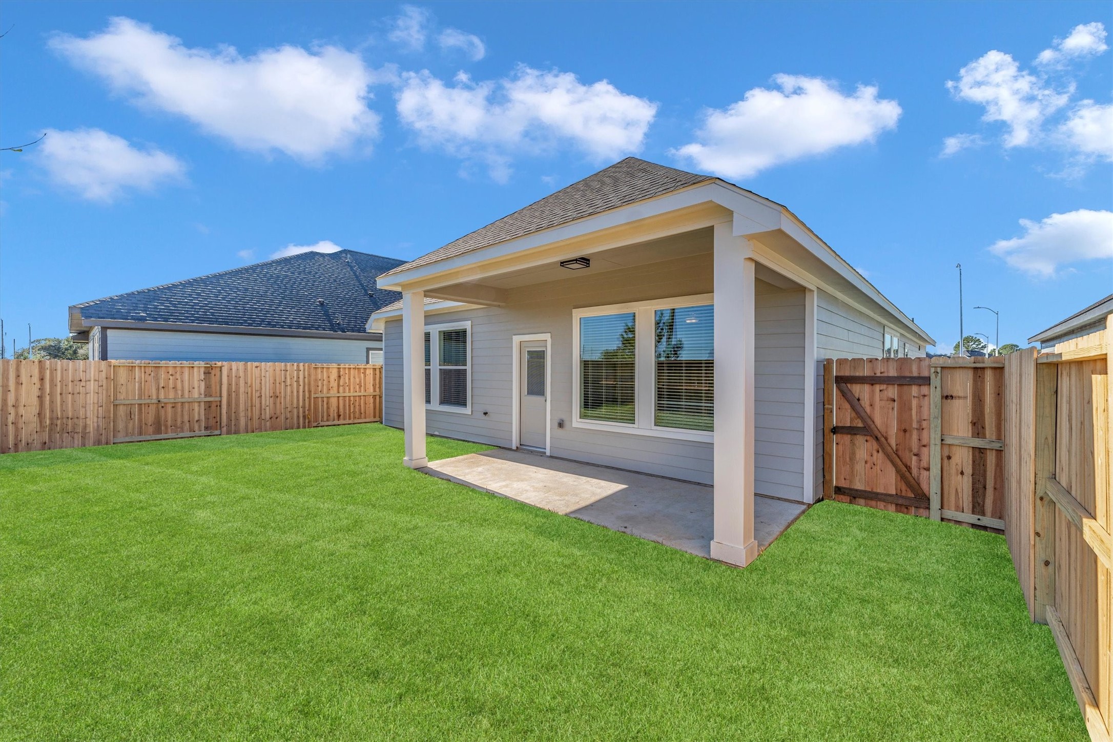 16026 Copper Skies Way Cypress, TX 77429 - Photo 10 of 47 Covered patio/fenced in back yard