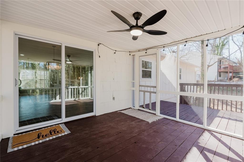 2976 Bay Berry Drive Southwest Marietta, GA 30008 - Photo 24 of 33 a view of a livingroom with wooden floor and a ceiling fan