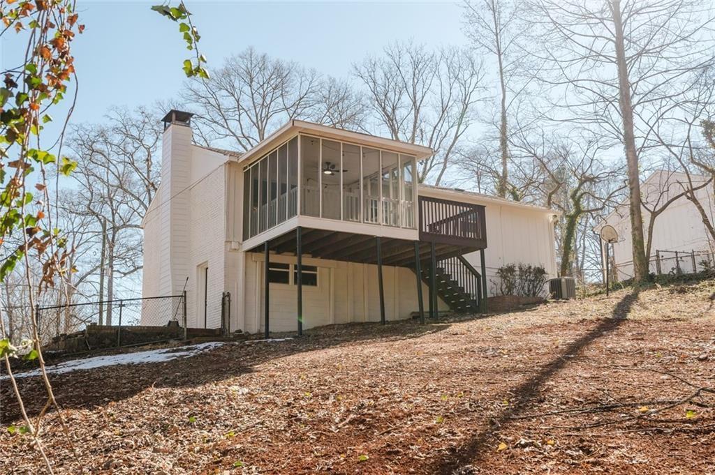 2976 Bay Berry Drive Southwest Marietta, GA 30008 - Photo 30 of 33 a front view of a house with a yard