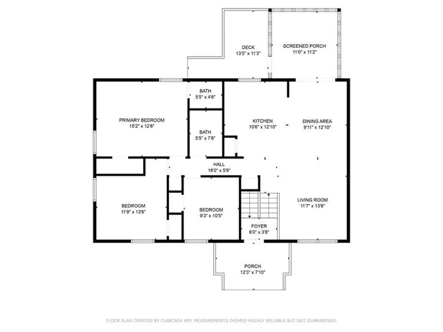 a picture of a bench in front of a wall