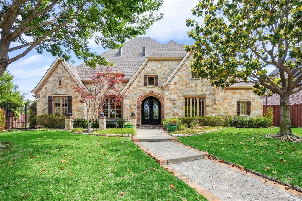 715 Duncan Drive Coppell, TX 75019 - Photo 1 of 1 a front view of a house with yard and green space