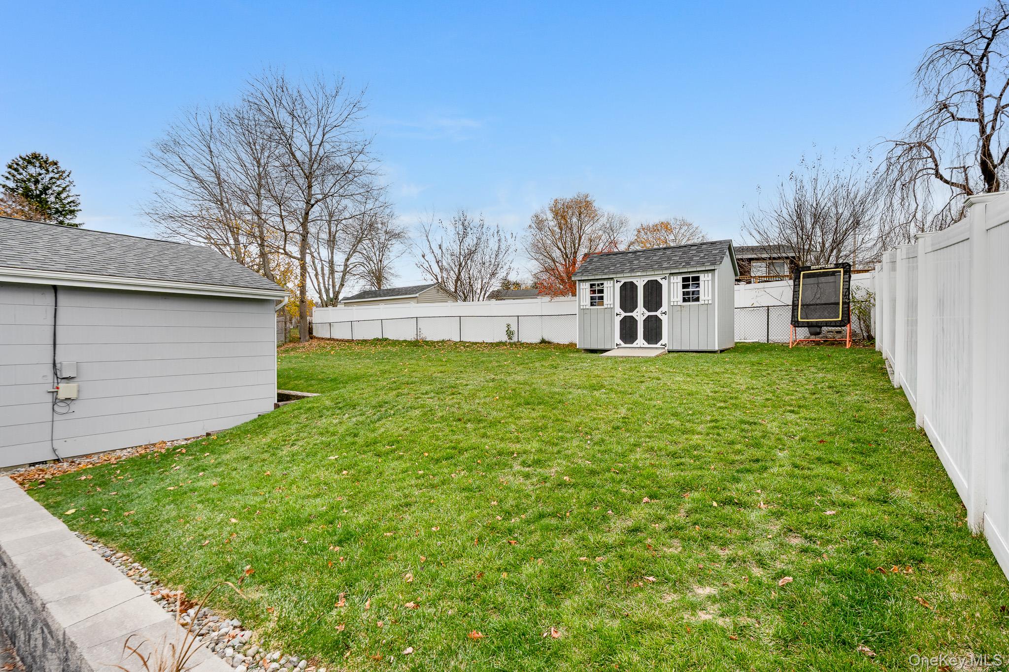 29 Wedgewood Road Fishkill, NY 12524 - Photo 16 of 19 a view of a house with a yard and sitting area