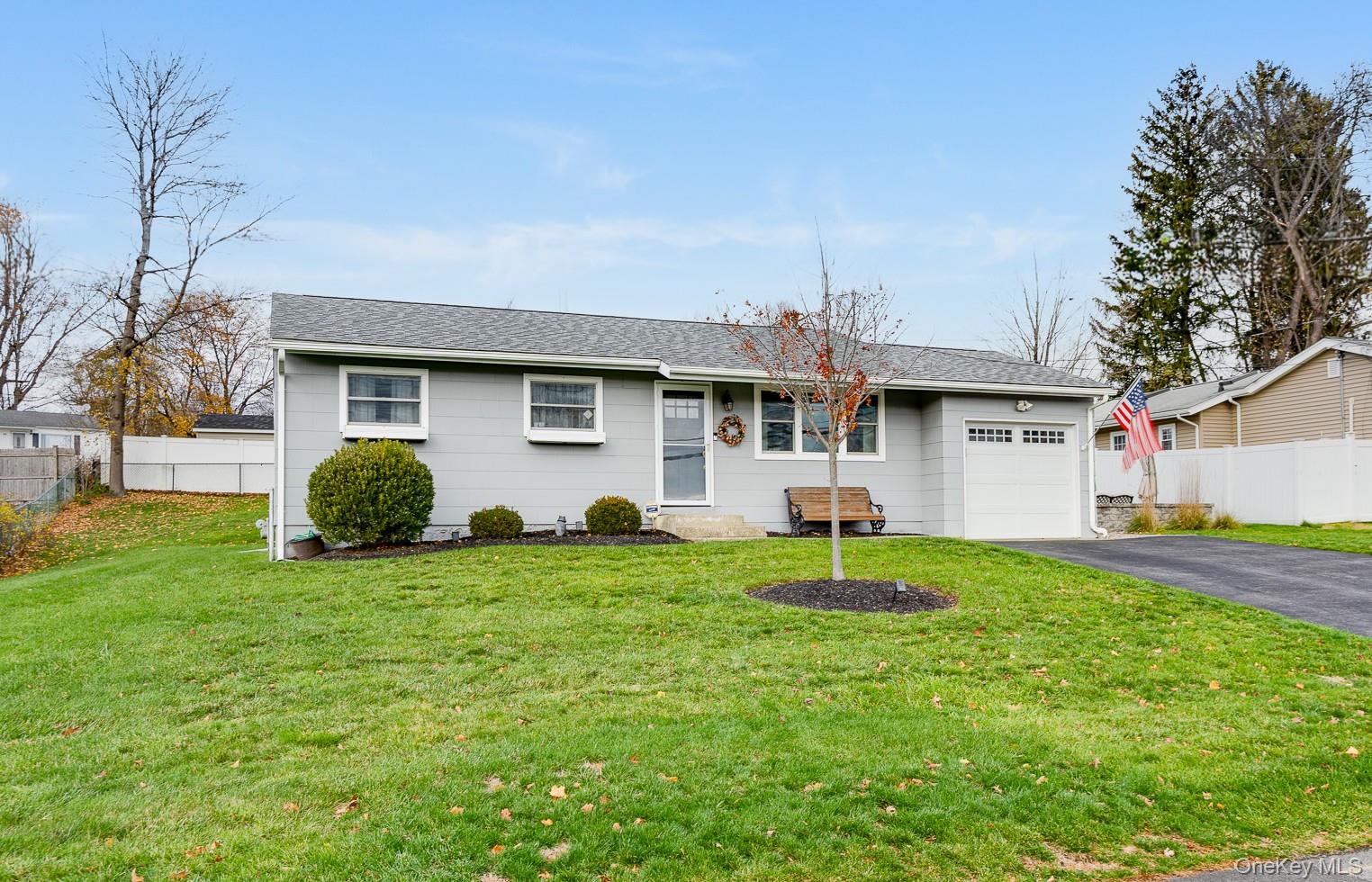 29 Wedgewood Road Fishkill, NY 12524 - Photo 3 of 19 a house with garden in front of it