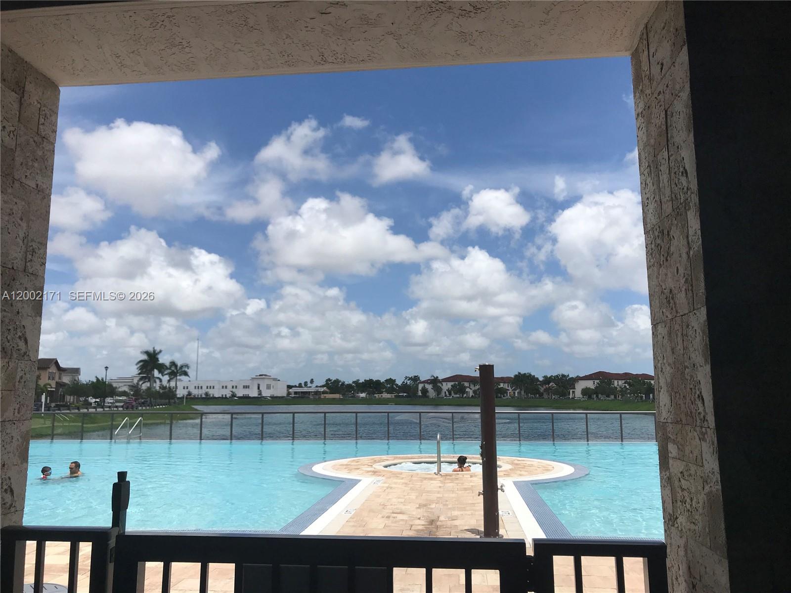 9515 Southwest 171st Place, Unit ANNEX Miami, FL 33196 - Photo 17 of 26 a view of lake from balcony