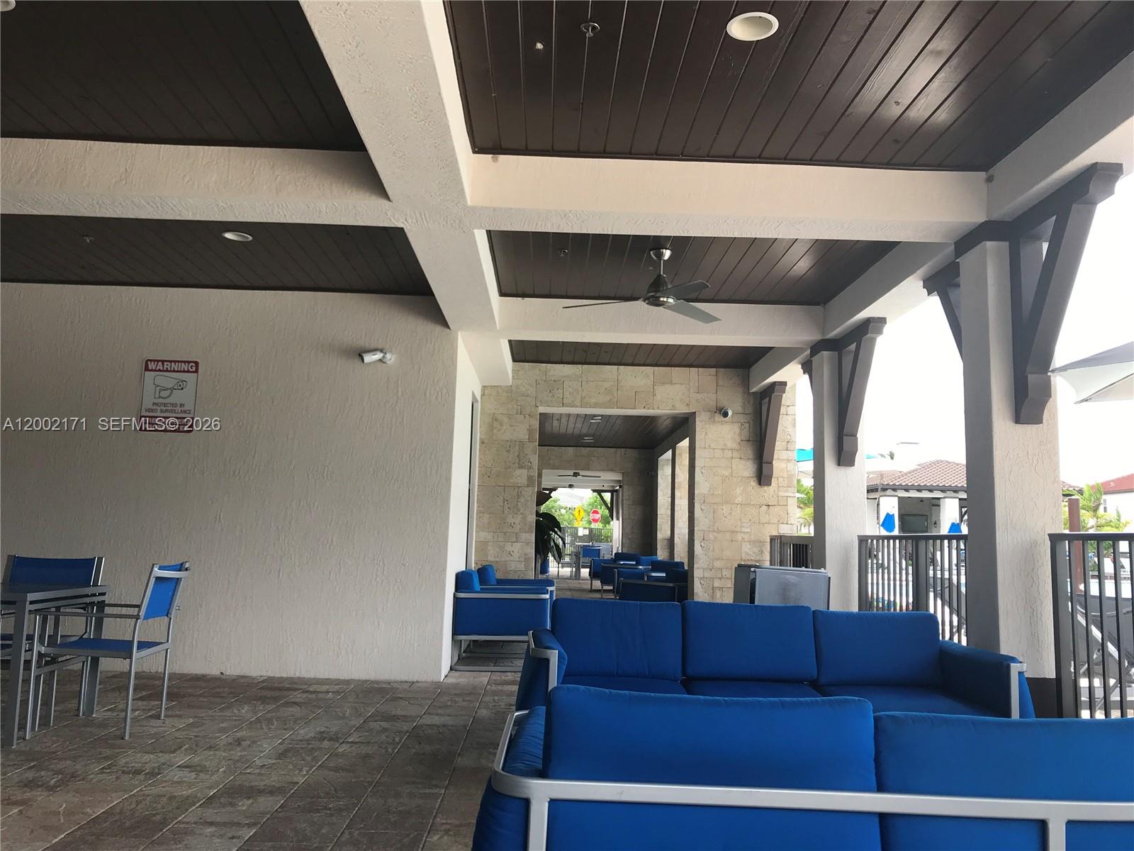 9515 Southwest 171st Place, Unit ANNEX Miami, FL 33196 - Photo 19 of 26 a living room with furniture