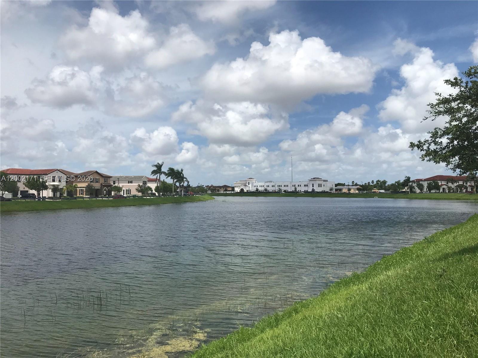 9515 Southwest 171st Place, Unit ANNEX Miami, FL 33196 - Photo 25 of 26 a view of a lake