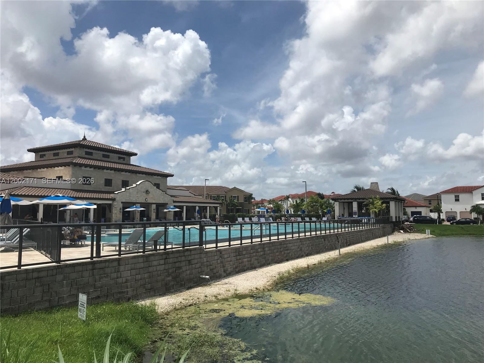 9515 Southwest 171st Place, Unit ANNEX Miami, FL 33196 - Photo 26 of 26 a view of a city from a terrace