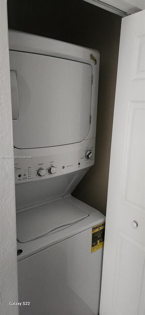 9515 Southwest 171st Place, Unit ANNEX Miami, FL 33196 - Photo 7 of 26 a close up view of washer and dryer