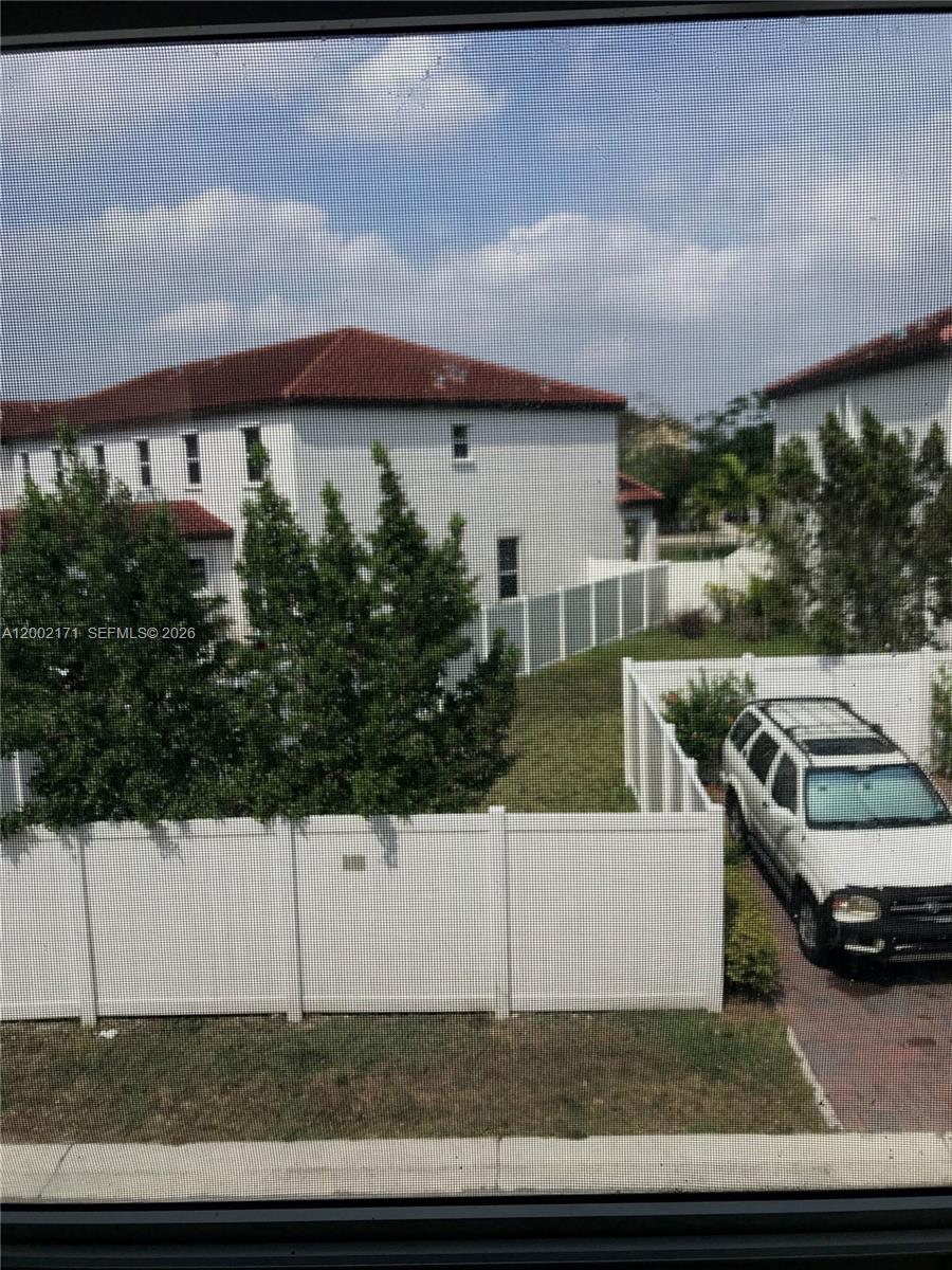 9515 Southwest 171st Place, Unit ANNEX Miami, FL 33196 - Photo 9 of 26 a view of a terrace