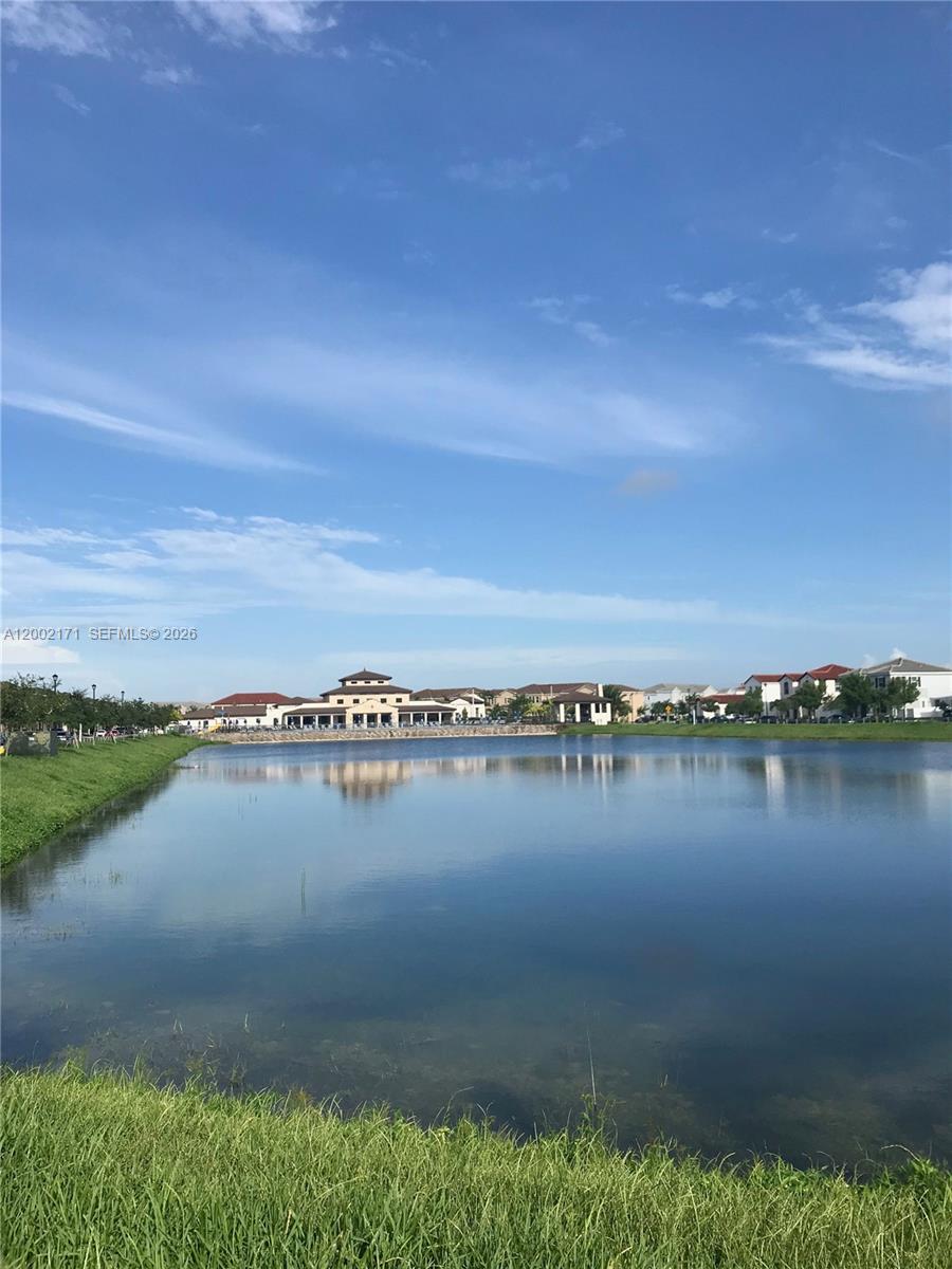 9515 Southwest 171st Place, Unit ANNEX Miami, FL 33196 - Photo 10 of 26 a view of a city with a lake
