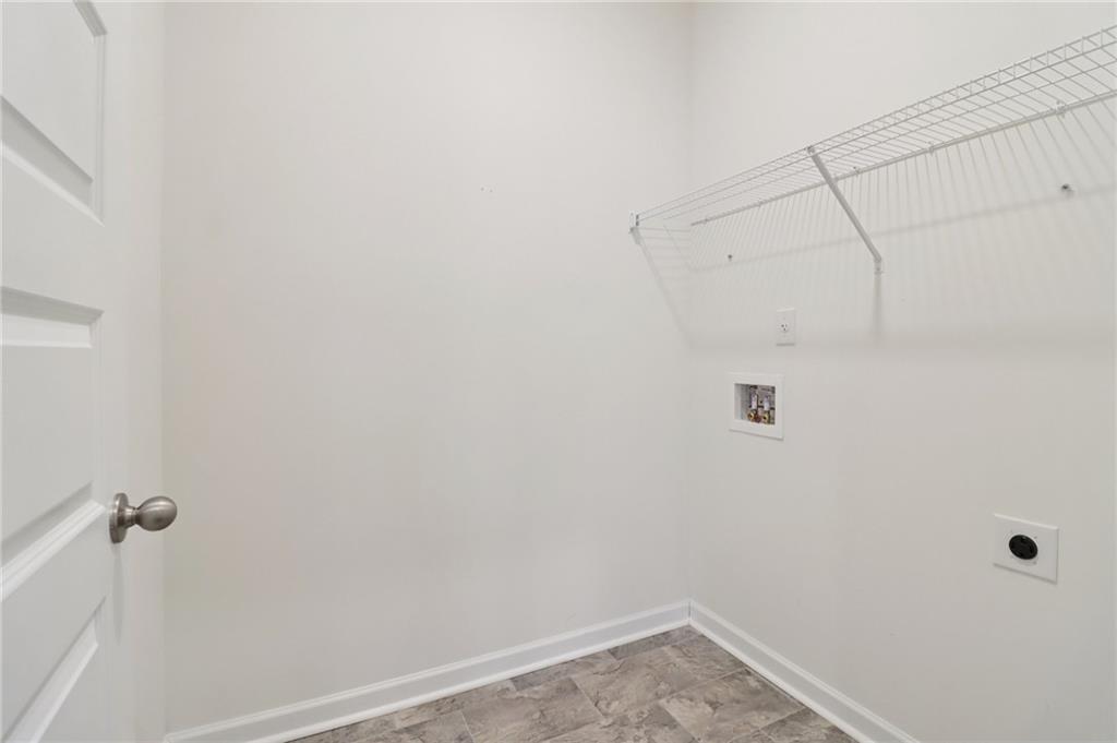 1729 Limousin Way Stockbridge, GA 30281 - Photo 20 of 26 a bathroom with a shower