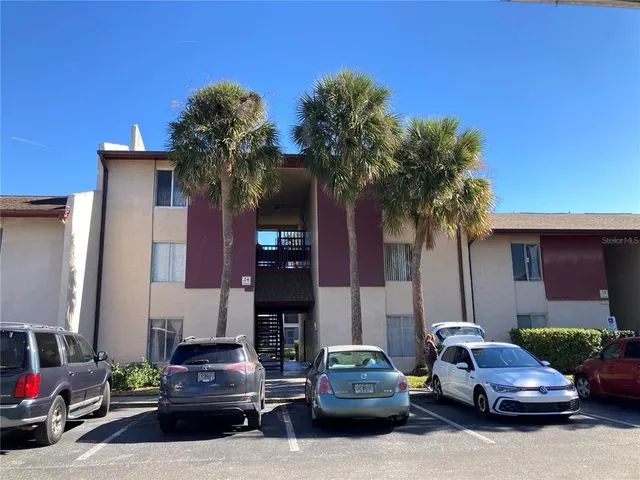 a car parked in front of a house