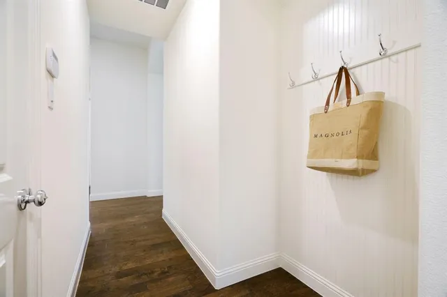 a view of hallway with stairs