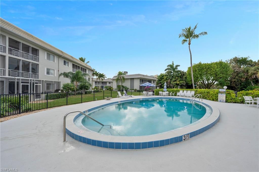 215 Cypress Way East, Unit C4 Naples, FL 34110 - Photo 15 of 15 a view of outdoor space and yard