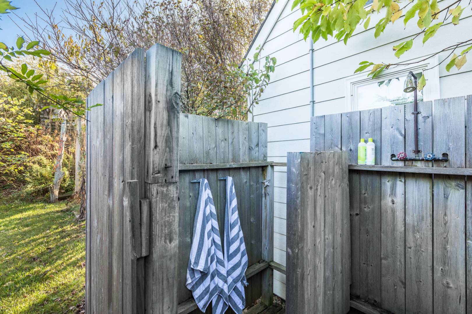 65 Navy Road Montauk, NY 11954 - Photo 16 of 20 a view of walk in closet with wooden fence