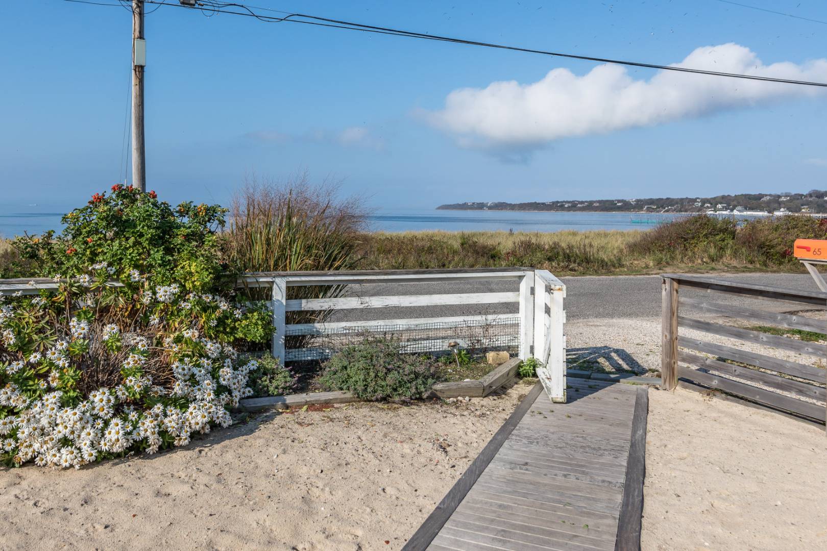 65 Navy Road Montauk, NY 11954 - Photo 3 of 20 a view of a terrace with a garden