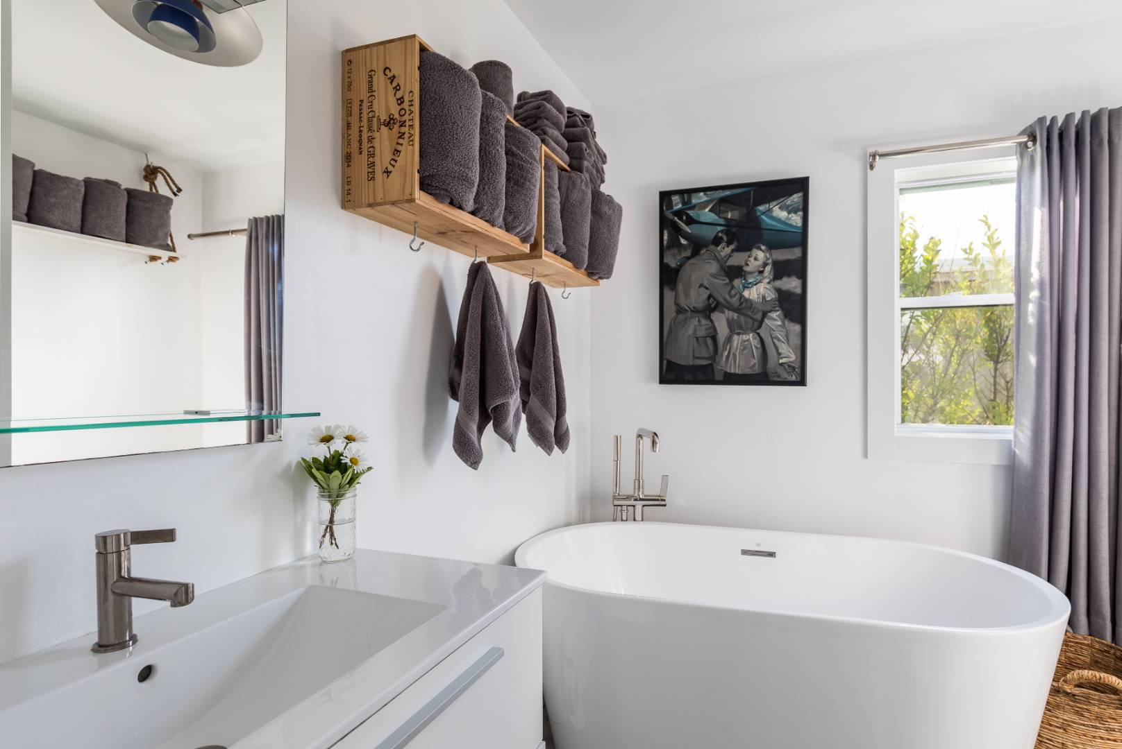 65 Navy Road Montauk, NY 11954 - Photo 9 of 20 a bathroom with a tub and sink