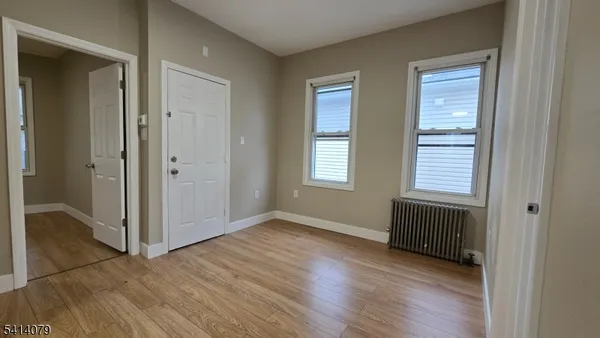 a view of livingroom with hardwood floor and window
