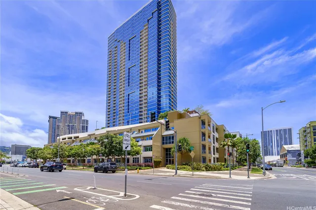 a view of a building with a street
