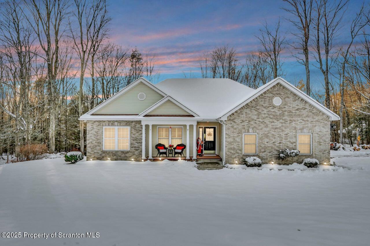106 Brookview Lane Greentown, PA 18426 - Photo 1 of 59 a view of a parked cars in front of house