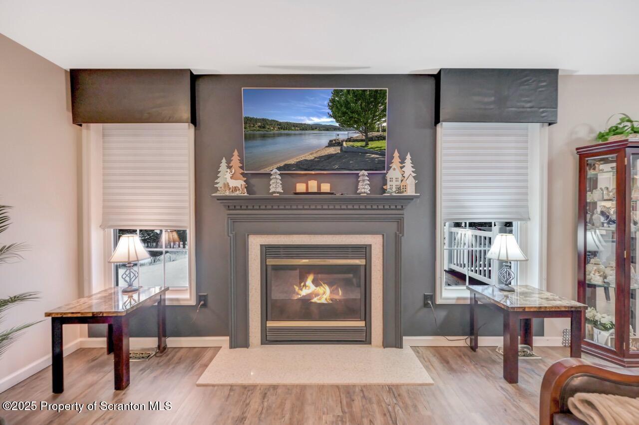 106 Brookview Lane Greentown, PA 18426 - Photo 14 of 59 a living room with furniture and a fireplace