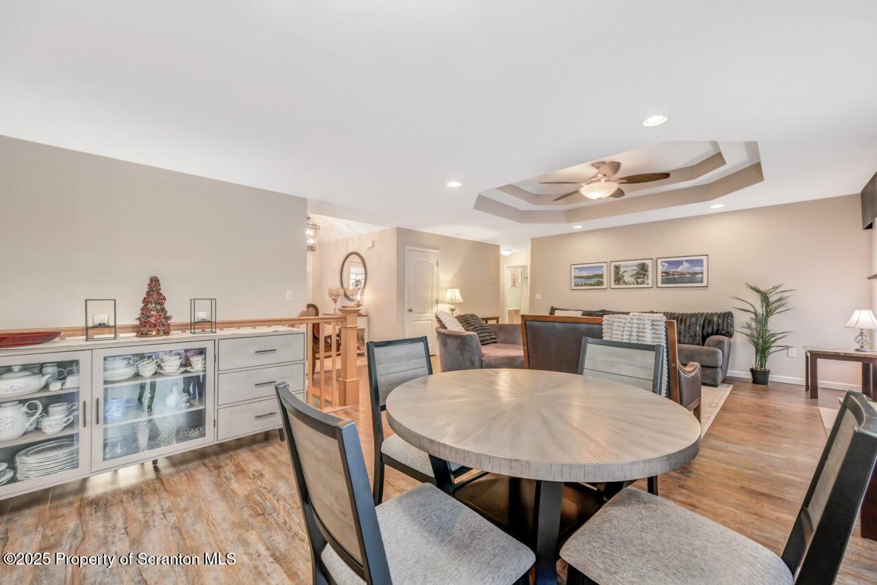 106 Brookview Lane Greentown, PA 18426 - Photo 18 of 59 a view of a dining room with furniture and wooden floor
