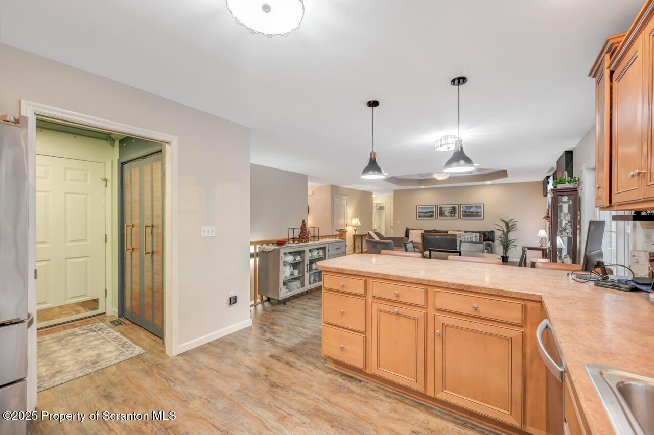 106 Brookview Lane Greentown, PA 18426 - Photo 23 of 59 a open kitchen with stainless steel appliances granite countertop a sink a stove and a refrigerator