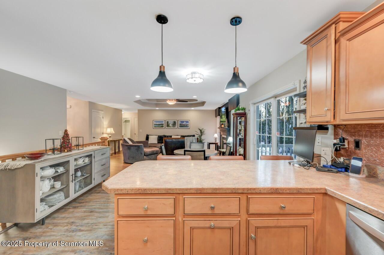 106 Brookview Lane Greentown, PA 18426 - Photo 24 of 59 a kitchen with stainless steel appliances granite countertop a sink a stove and a wooden floors