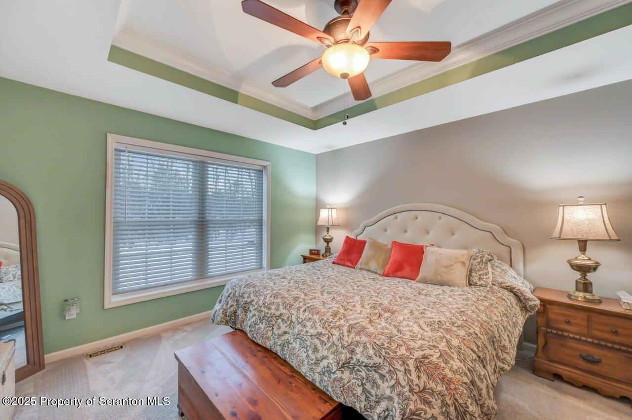 106 Brookview Lane Greentown, PA 18426 - Photo 28 of 59 a bedroom with a large bed and a window