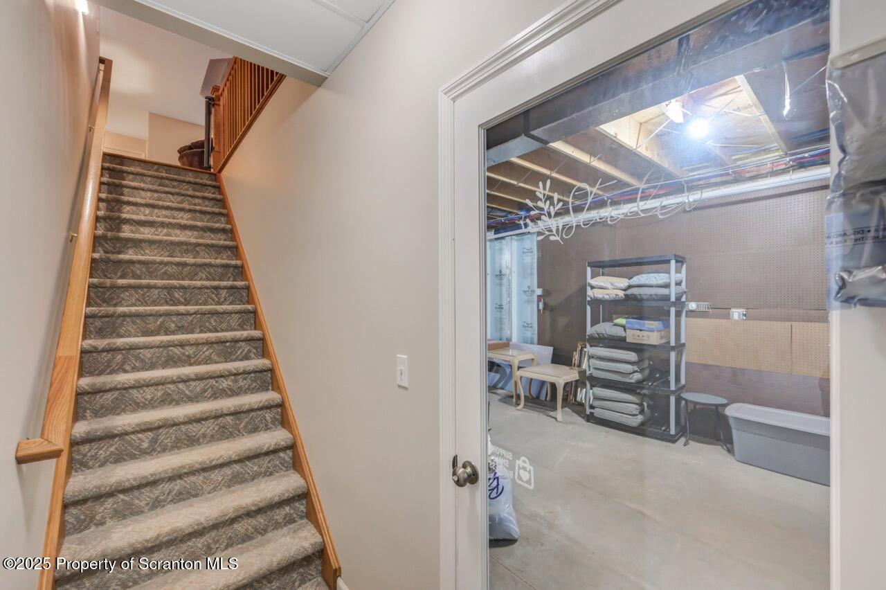 106 Brookview Lane Greentown, PA 18426 - Photo 47 of 59 a view of entryway with stairs and furniture