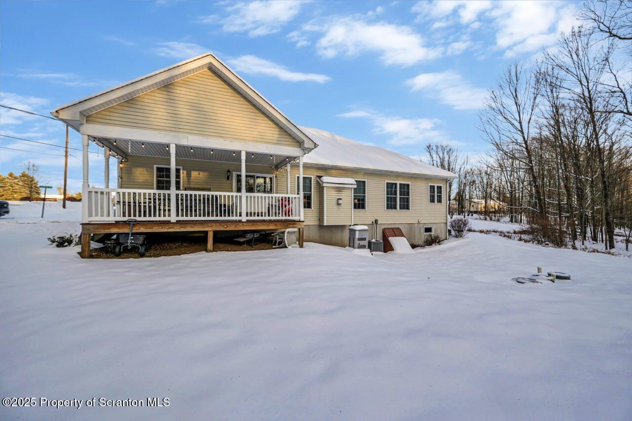 106 Brookview Lane Greentown, PA 18426 - Photo 57 of 59 a front view of a house with a yard