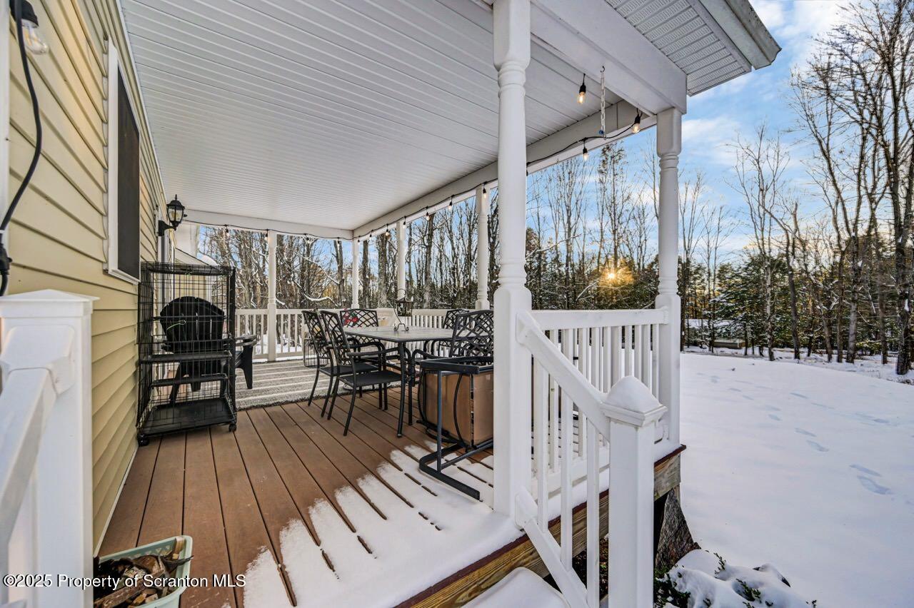 106 Brookview Lane Greentown, PA 18426 - Photo 58 of 59 a view of balcony and deck with patio