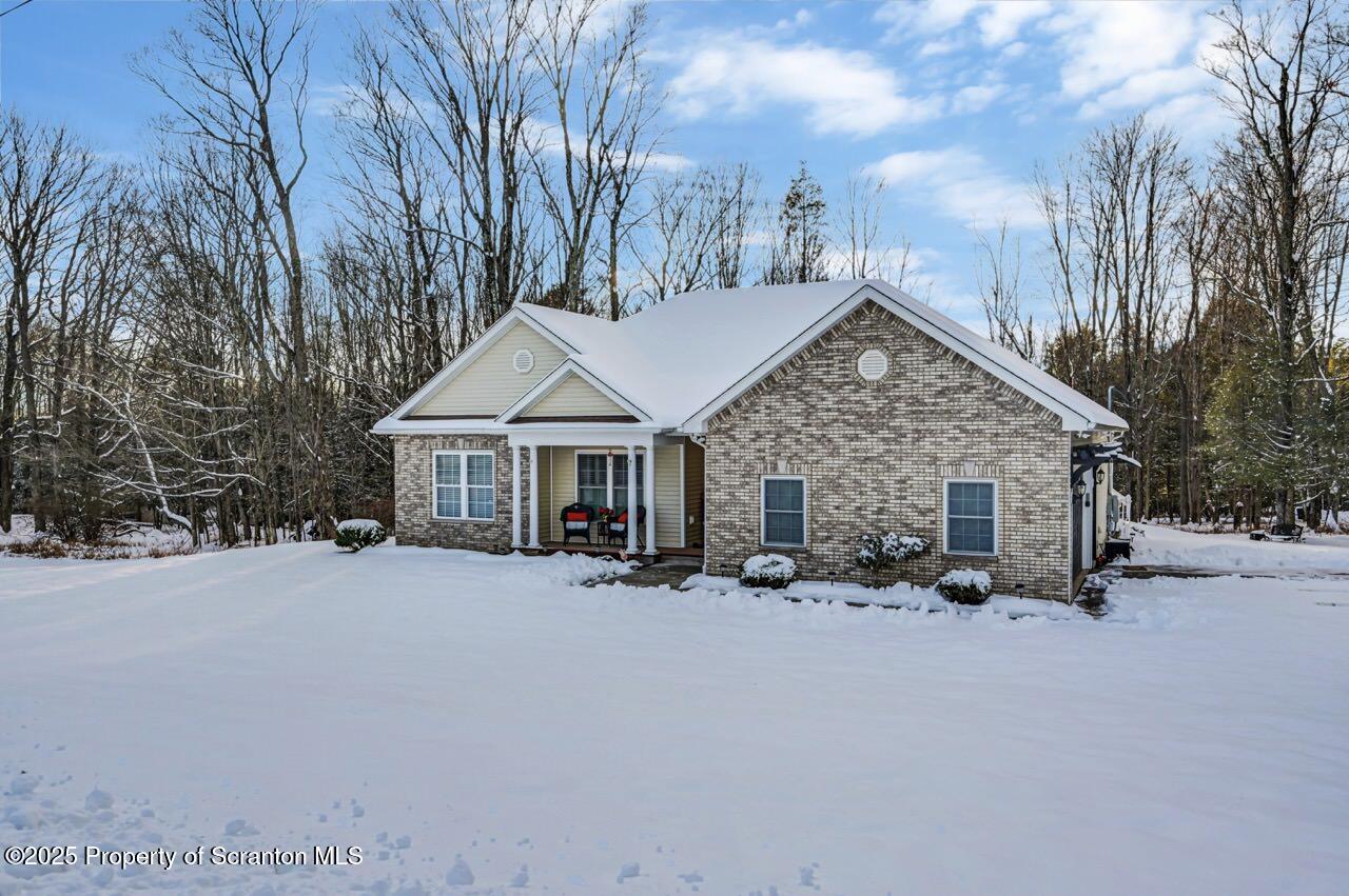 106 Brookview Lane Greentown, PA 18426 - Photo 59 of 59 a view of a house with yard and sitting area