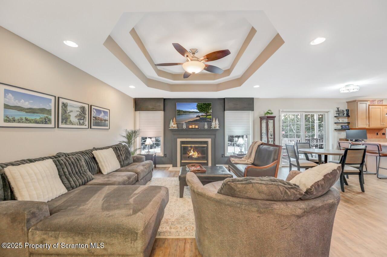 106 Brookview Lane Greentown, PA 18426 - Photo 9 of 59 a living room with fireplace furniture and a large window